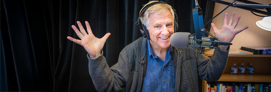 Rick waving his hands in radio studio