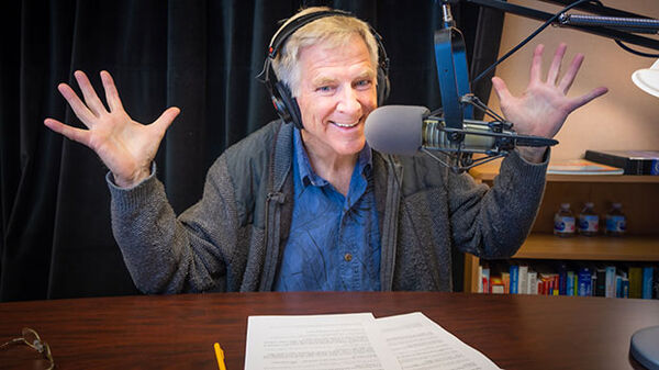 rick-waving-hands-in-radio-shis-tudio