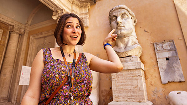 Woman with statue at Capitoline Museum, Rome