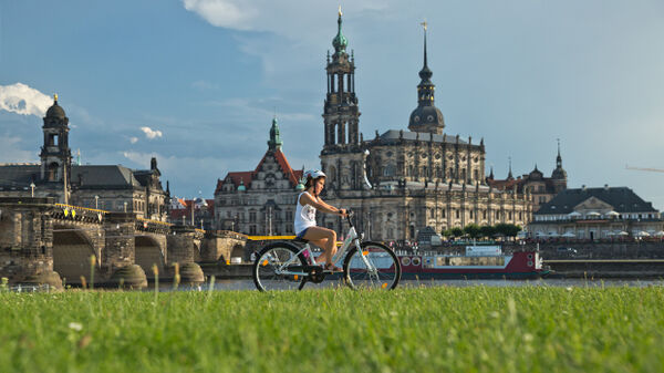 City skyline and biker, Dresden, Germany