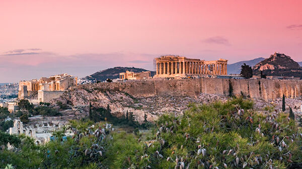 pink sunset over acropolis in athens