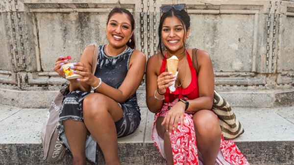 Two young smiling women with ice cream, Croatia
