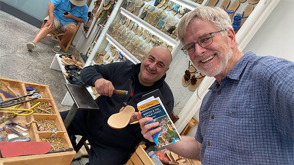 Rick holding Amalfi Coast book in Italy