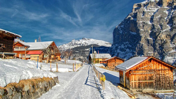 Snowy village and mountains, Switzerland