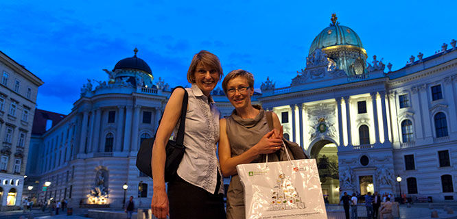 two women holding shopping bags in vienna