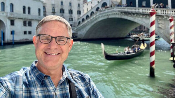 Cameron Hewitt at Rialto Bridge, Venice, Italy