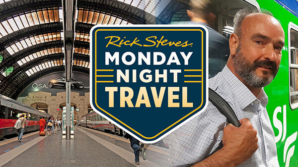 empty train station in europe and man with backpack