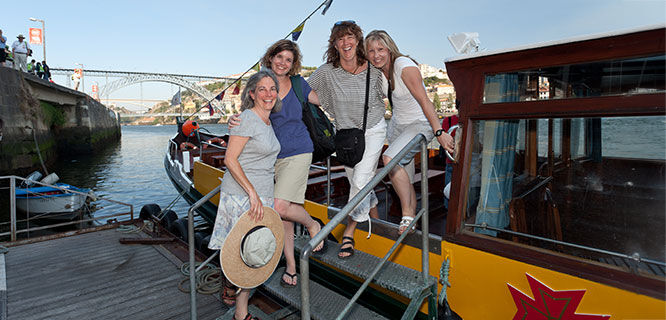 ladies infront of porto river boat