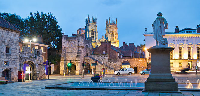 york cathedral and street scene at dusk