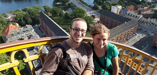 Man and woman on staircase above copenhagen