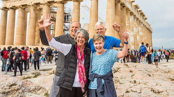 Foursome at Acropolis with ruins in background, Athens, Greece