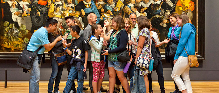 Adult and youth tour members at Rijksmuseum, Amsterdam, Netherlands