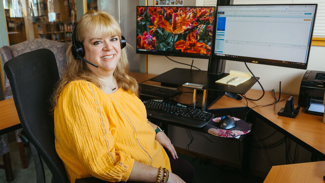 woman with computer screen