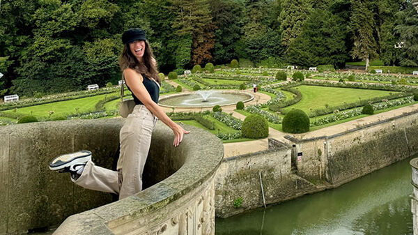 woman overlooking garden