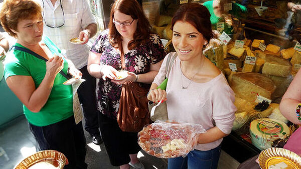 Woman on food tour, Rome, Italy