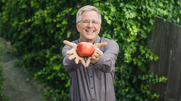 Rick holding apple