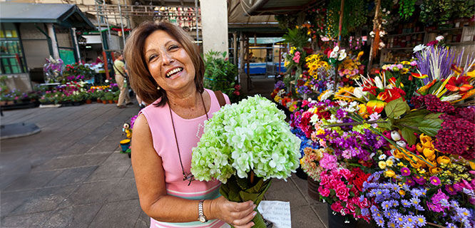 woman holding a bunch of hydrangea flowers