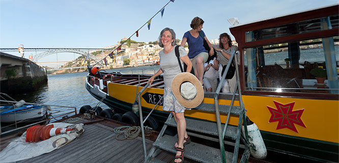 woman stepping off a boat