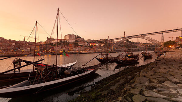 Skyline view with peachy sky, Porto, Portugal