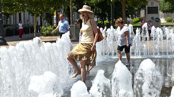 Lady walking in fountain, Budapest, Hungary