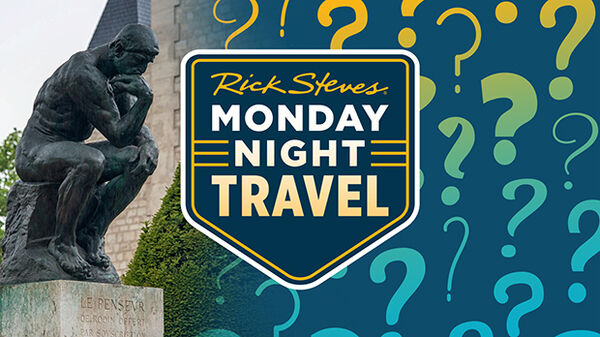 Thinker statue on left question marks on right