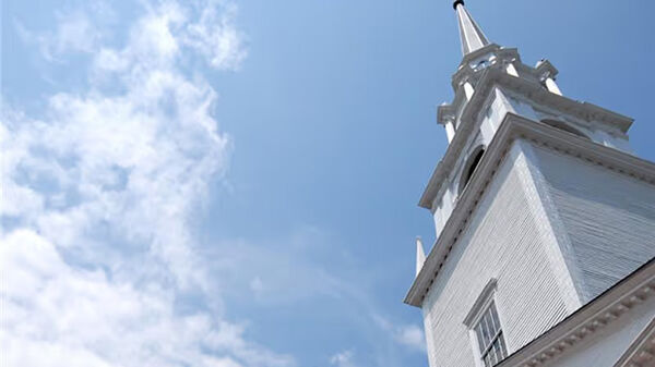 steeple of a white wodden church