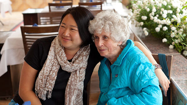 two ladies sitting together