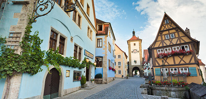 Blue buildings on cobbly street, Rothenburg ob der Tauber, Germany
