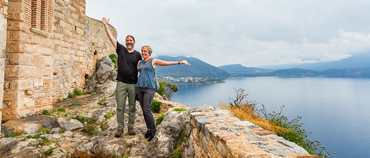 Smiling couple in upper town, Monemvasia, Greece