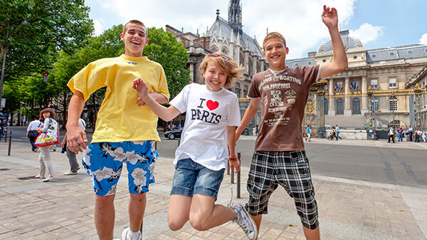 three-kids-jumping-in-paris